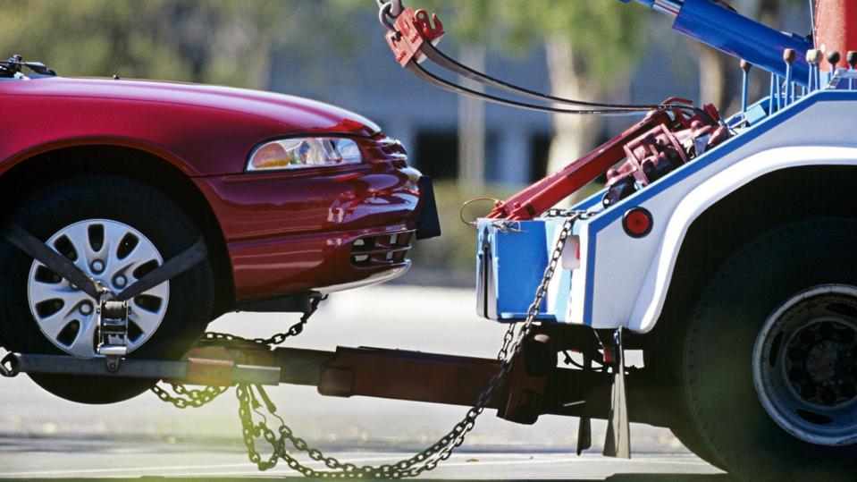 how to get a towed car back without paying